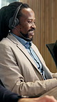 Man, headset and discussion in call center for help, customer support and finance advice. Coworking, mature agent and mic in agency for client communication, virtual meeting and insurance feedback
