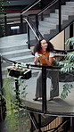 Woman, thinking and phone on steps for business, research and planning green initiative for company. PR, campaign manager and tech in workplace for policy update, eco project and incentive ideas