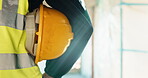 Construction, builder and safety with helmet in building, regulatory compliance and site inspection. Architecture, quality control and person with hard hat for protection, ppe or property development