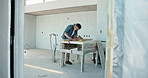 Carpenter, man and sanding wood with home renovation, building furniture and craftsman for project. Person, sandpaper and woodwork in house with remodeling, timber and carpentry for construction.