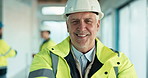 Construction, face and man on site with helmet, contractor and ambition in industrial development. Happy, portrait and mature engineer with ppe hardhat, handyman and confidence in building project.