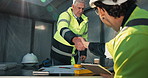 Handshake, construction and people with blueprint for planning, agreement and remodeling project. Architecture, meeting and men shaking hands for building, engineering and layout for renovation 