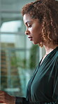 Thinking, office and business woman typing for financial report, research and budget proposal. Corporate, happy and person on tech for finance review, wealth management and planning for investment