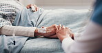 Medical, nurse or senior person in hospital with holding hands, comfort or empathy for diagnosis. Wellness, elderly patient or doctor with consoling, understanding or sympathy for healthcare results.