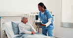 Tablet, nurse and patient in hospital bed for consulting, surgery results and feedback for treatment. Healthcare, clipboard and worker with senior woman for recovery, health report or medical service
