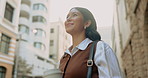 Thinking, business and woman in city with smile, evaluation and daydreaming for real estate. Below, female person or realtor in town with vision, reflection and property auction for urban development