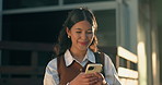 Phone, smile and businesswoman in city with texting, communication or update on legal case. Technology, happy and attorney with cellphone for email with positive review on law project in urban town.