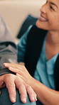 Comfort, hands and caregiver with old man in nursing home, conversation and help for senior patient. Assisted living, nurse and support for elderly person, discussion and compassion for pensioner