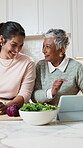 Cooking, tablet and senior mom with woman for bonding with meal prep, lunch and supper. Happy, home and elderly parent with adult daughter on tech for recipe, connection and talking in kitchen