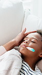 Thermometer, sick and parent with boy in bed for health, virus or infection in home for childcare. Family, closeup and hands of mom with child in bedroom to check temperature for cold, fever and flu