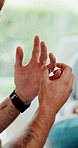 Hands, man and nervous in therapy with wedding ring, restless or divorce stress for mental health. Person, fidget or jewellery in office for counseling, anticipation and regret separation with phobia