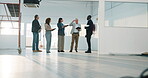Construction, building or team on site for evaluation, safety check or inspection of renovation. People, review or architect group with tablet, progress track or code compliance in remodeling project
