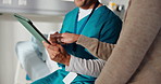 Doctor, pointing and hands with tablet in clinic, healthcare and explaining test results to patient. Hospital, medical professional and discussion with mature person, online and diagnosis on website