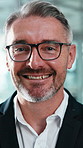 Happy, face and businessman with glasses in office, lawyer or confident with law career development. Corporate, attorney and mature person with eyewear, laughing and pride for job experience in USA