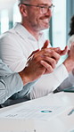Hands, business and people in meeting with applause, good news and success for revenue increase. Smile, team and clapping in workplace with document, finance report and celebration for profit growth