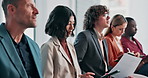 Business, woman and tablet in waiting room for interview, application and resume for hiring. People, candidates and listening in office with digital, online cv and recruitment process for onboarding
