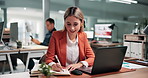 Woman, laptop and writing in office with notebook, productivity data and goal setting for job KPI. Coworking, happy person and performance analysis with computer, diary notes or time management stats