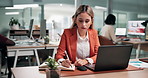 Businesswoman, laptop and writing in office with notebook, productivity data or goal setting for KPI. Coworking, person and performance analysis with computer, diary notes and time management stats.