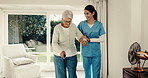 Happy, physiotherapist and old woman in nursing home with cane, exercise and discussion for wellness. Healthcare worker, support and senior person with walking stick, recovery and physical therapy.