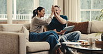 Finance, tablet and couple high five in house for insurance payout, loyalty reward and support. Happy, mature people and celebration with digital wallet for credit score goal, tax refund and cashback