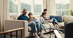 Happy, tablet and parents with children on sofa for bonding, connection and relax together on weekend. Family, love and kids with dad, mom and tech for watching videos, streaming and drawing in home