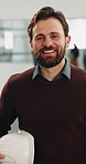 Architect, face and happy man with helmet in workplace for construction or building development. Portrait, male person or proud contractor with smile for architecture safety, security or improvement