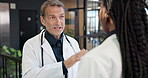 Planning, man and talking with doctors in hospital for diagnosis report, healthcare and advice. Medical collaboration, discussion and meeting with people in clinic for consulting, help and review