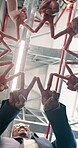 Happy people, star and solidarity with team in business, motivation or collaboration for assignment. Office, synergy and partnership with colleagues, low angle and hands together for agreement