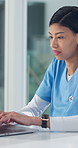 Nurse, woman and typing on laptop for medical progress note, MAR insight and clinical findings. Health, professional or thinking with tech in clinic for care plan update, outpatient referral or admin