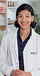 Face, woman and happy pharmacist with medical career, confidence or retail service in pharmacy. Portrait, healthcare worker or person in drug store with smile, pharmaceutical or trustworthy in Mexico