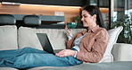 Laptop, movie and woman with coffee in house, relax and watching series with subscription in lounge. Streaming, online and happy person with hot beverage, chilling and entertainment with tech in home