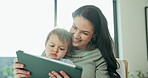 Tablet, relax and mother with toddler in home for watching educational video, show or film in living room. Happy, digital technology and mom with boy baby for streaming movie in app in apartment.