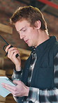 Man, radio and tablet at workshop for carpentry, research and instructions for project production. Person, carpenter and chat at factory with tech, coordination and advice for manufacturing furniture