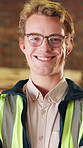 Carpenter, pride and face of man in workshop for woodworking, confident and timber production. Portrait, crossed arms and person with glasses for furniture manufacturing, lumber business or carpentry