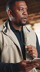 Carpenter, thinking and black man with checklist for inventory, wood production or inspection. Male person, artisan or writing with clipboard for carpentry, stock distribution or schedule in workshop