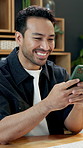 Businessman, discussion and typing with phone in office for social media, communication or chat. Man, employee or texting with smile on mobile smartphone for business conversation, app or proposal