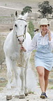 Phone call, horse and woman talking with ranch management, laugh or grooming appointment. Mobile, cowgirl and happy person speaking to contact at countryside, walking or booking for animal care