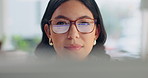 Glasses, reading and businesswoman in office with computer for research on creative project at startup. Job, spectacles and magazine editor with tech for online article with editing in workplace.