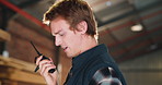 Man, carpenter or talking with radio in warehouse for wood production, communication or distribution. Male person, carpentry or discussion with speaker or signal for lumber stock or timber shipping