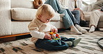 Future, problem solving and toy with baby boy in home living room for motor skills development. Growth, playing and thinking with child on apartment floor for coordination, curiosity or intelligence