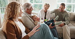 Grandparents, parents and laugh in house with baby, visit and bonding together for weekend break. Happy people, family generations and boy child play in living room with toys, love and conversation.