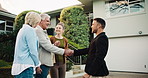 Family, handshake or realtor with keys in new home for open house, agreement or deal together. Mature, mom and dad shaking hands with adult daughter or real estate agent for property or mortgage loan