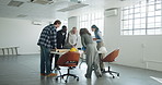 Architect, team and planning in office for construction project, blueprint review or evaluation. People, architecture and development meeting with notes, design revision or maintenance with feedback