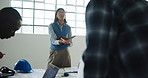 Architect, woman and notebook in meeting for idea, construction or problem solving in office. People, writing notes and think with team, design solution or engineering review for development planning