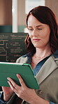 Programmer, code and woman with tablet in office, problem solving or software development on website. Programming, online and person with technology, cybersecurity and data analysis for system update