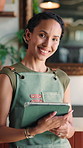 Happy, woman and face of waitress with tablet in cafe with research, inventory or online menu update. Portrait, technology and barista in coffee shop for order on app, website or customer service.