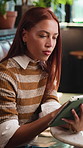 Tablet, research and businesswoman in cafe for remote work with email update on creative project. Reading, digital technology and editor with freelance job opportunity in coffee shop or restaurant.