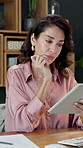 Woman, thinking and typing in office with tablet, research and budget report for project management. Mature person, problem solving and scroll in business with tech, financial planning and schedule.