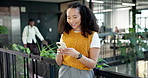 Laugh, texting and woman in office with phone, online communication and comic post on chat app. Happy, digital and employee in agency with tech, funny message and business meme on social media.