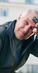 Fitness, tired and old man in city for rest, workout recovery and wipe sweat with bottle. Exercise break, active retirement and person with runner for water, exhausted or cool down with fatigue